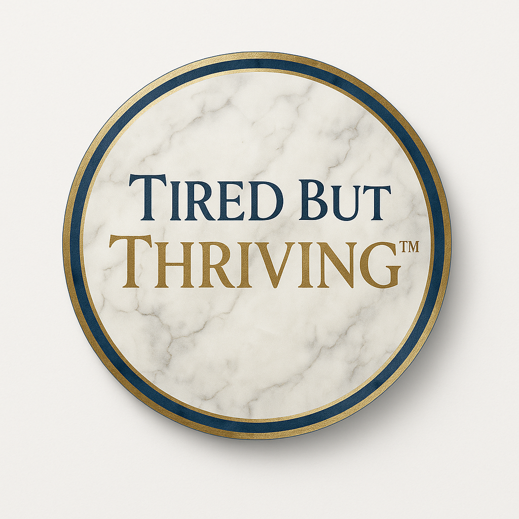 Tired But Thriving™ orb logo with marble, gold, and royal blue design